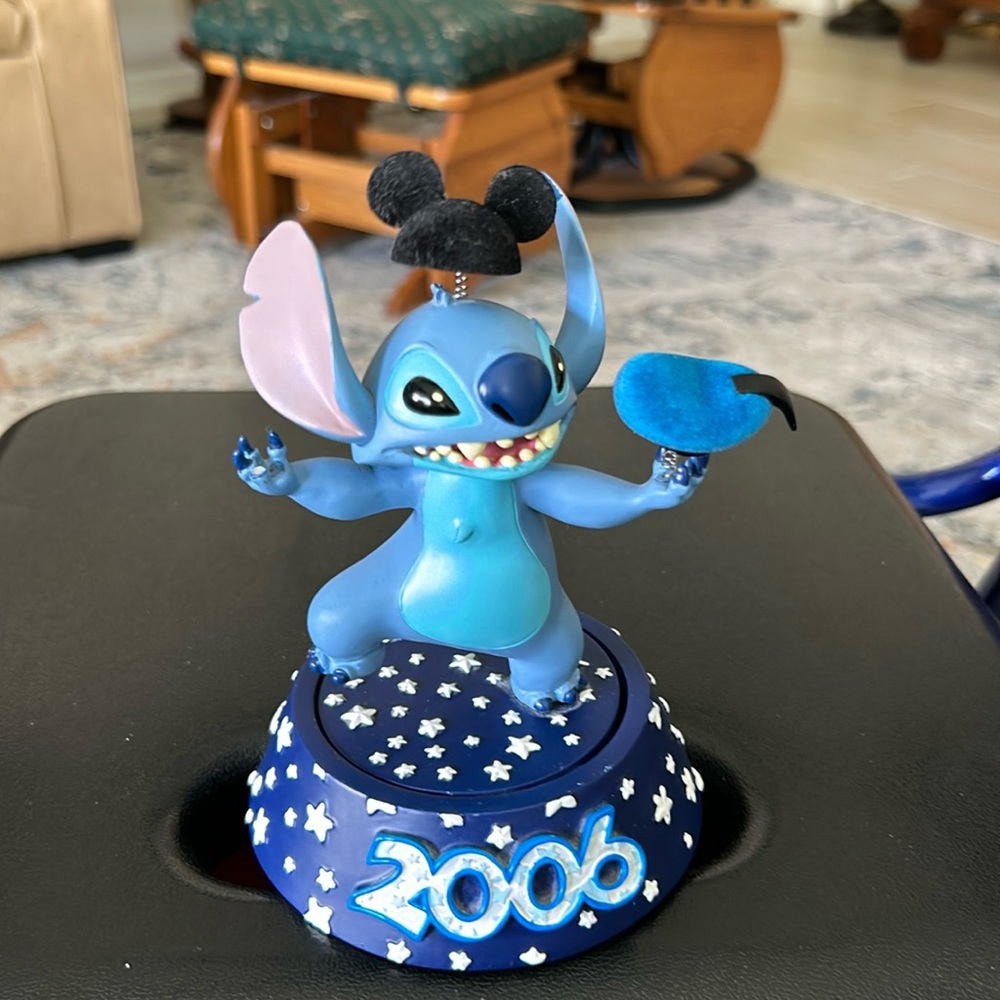 Disney, limited edition 2006 stitch with Donald hat, and Mickey ears on top